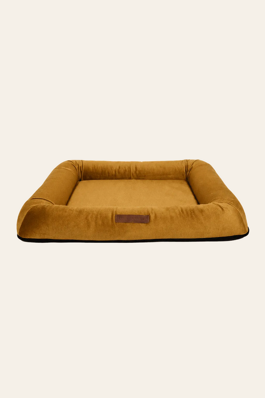 Monolith design hondenbed van goudbrons meubelfluweel