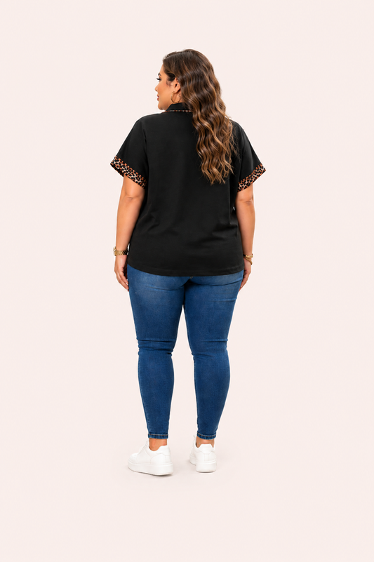 Zwarte top met luipaardprint en halve rits