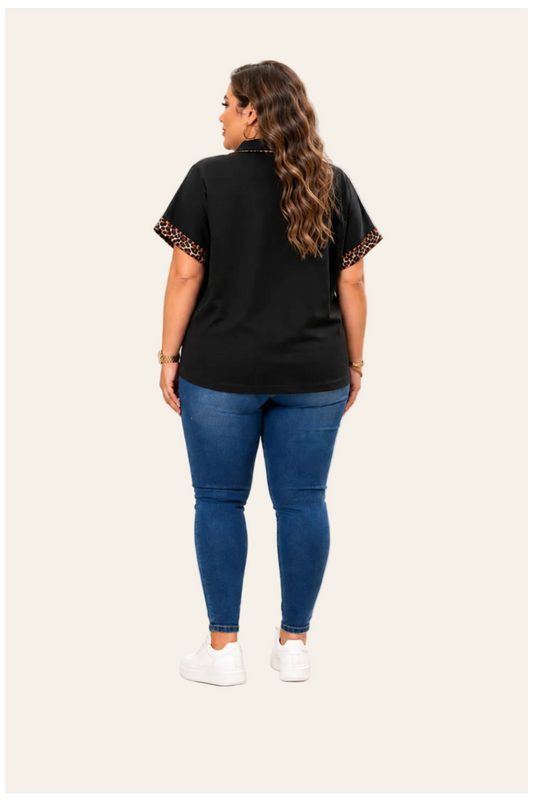 Zwarte top met luipaardprint en halve rits