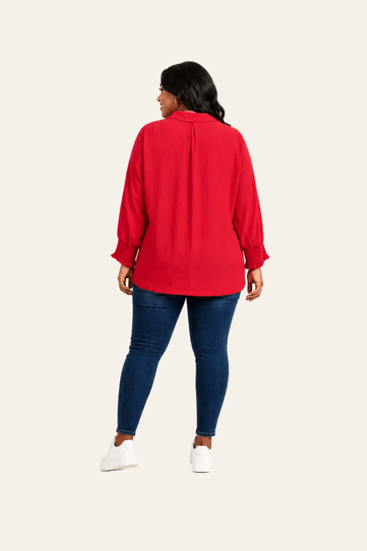 Rode oversized blouse met dolman mouwen