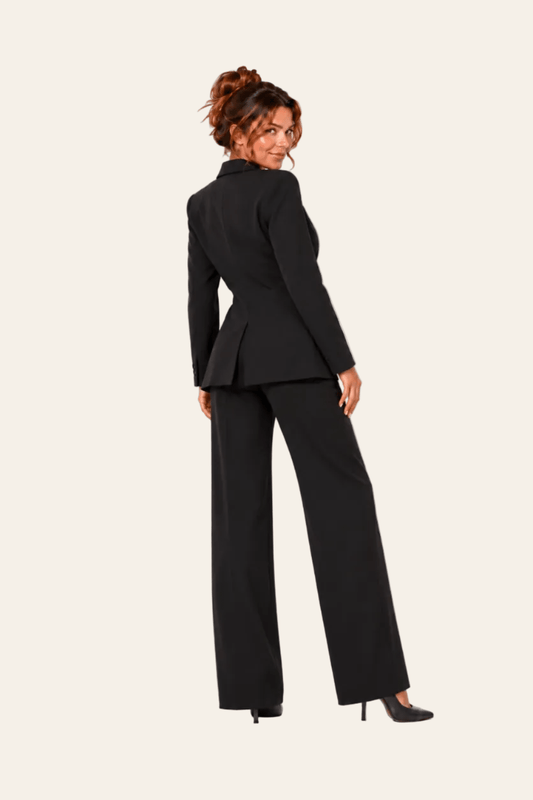 Achteraanzicht van zwarte LMB Boutique damesset met blazer en palazzo broek.