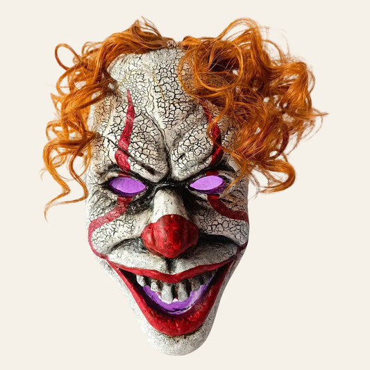 Griezelig clownmasker voor halloween met oranje haar