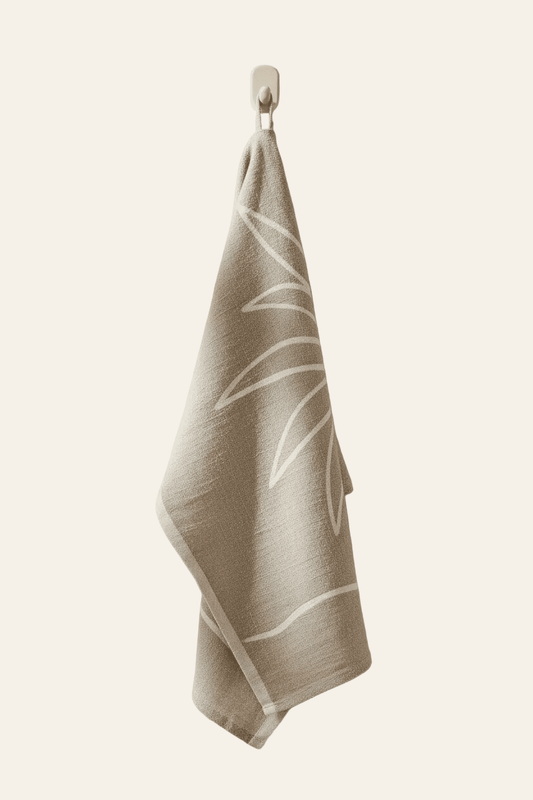 Linnen keukenhanddoek palmboom hangend aan een hanger