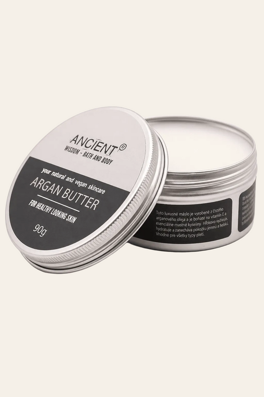 Pure bodyboter met arganolie op een licht beige achtergrond als productfoto