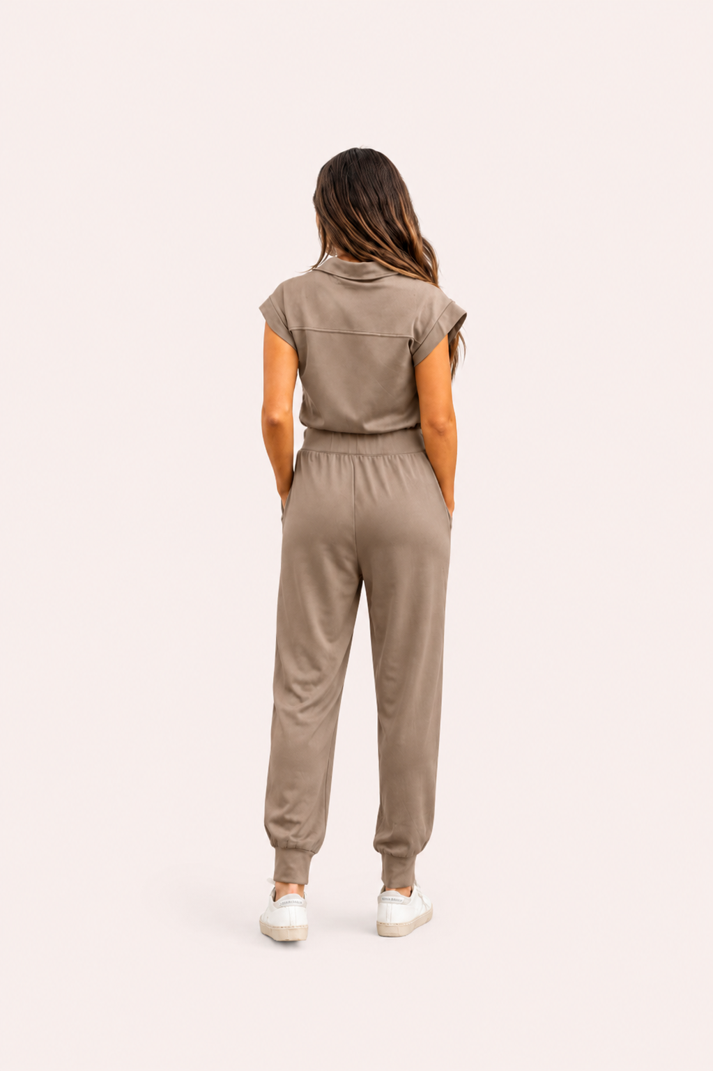 Donkergroene jumpsuit met ritssluiting