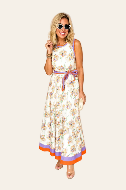 Witte mouwloze maxi jurk met bloemenprint en ceintuur