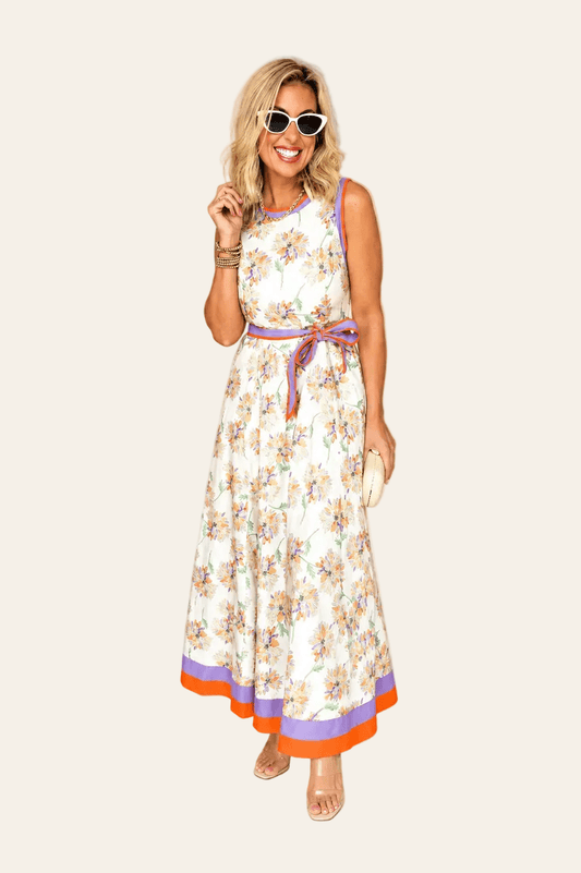 Witte mouwloze maxi jurk met bloemenprint en ceintuur