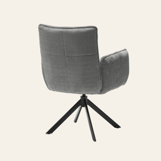 Nova draaibare armstoel in lichtgrijskleur met pocketvering, achteraanzicht met ergonomisch gevormde zitting en rugleuning.