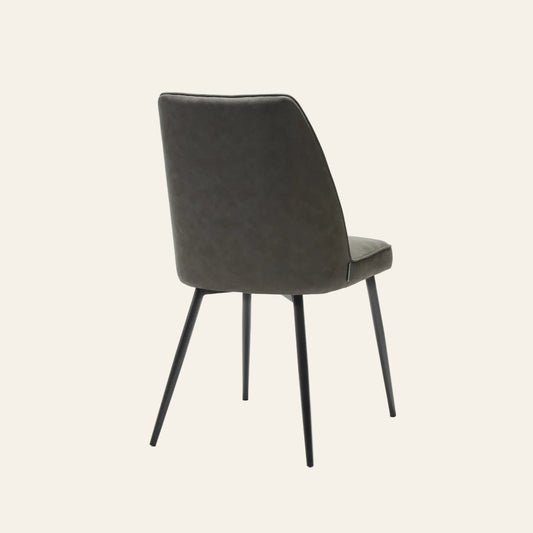 Stoel eetkamerstoel in antracietkleur, achteraanzicht met ergonomisch gevormde rugleuning.