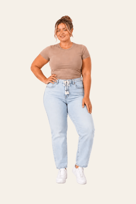 Women's balloon-fit jeans with tie belt
