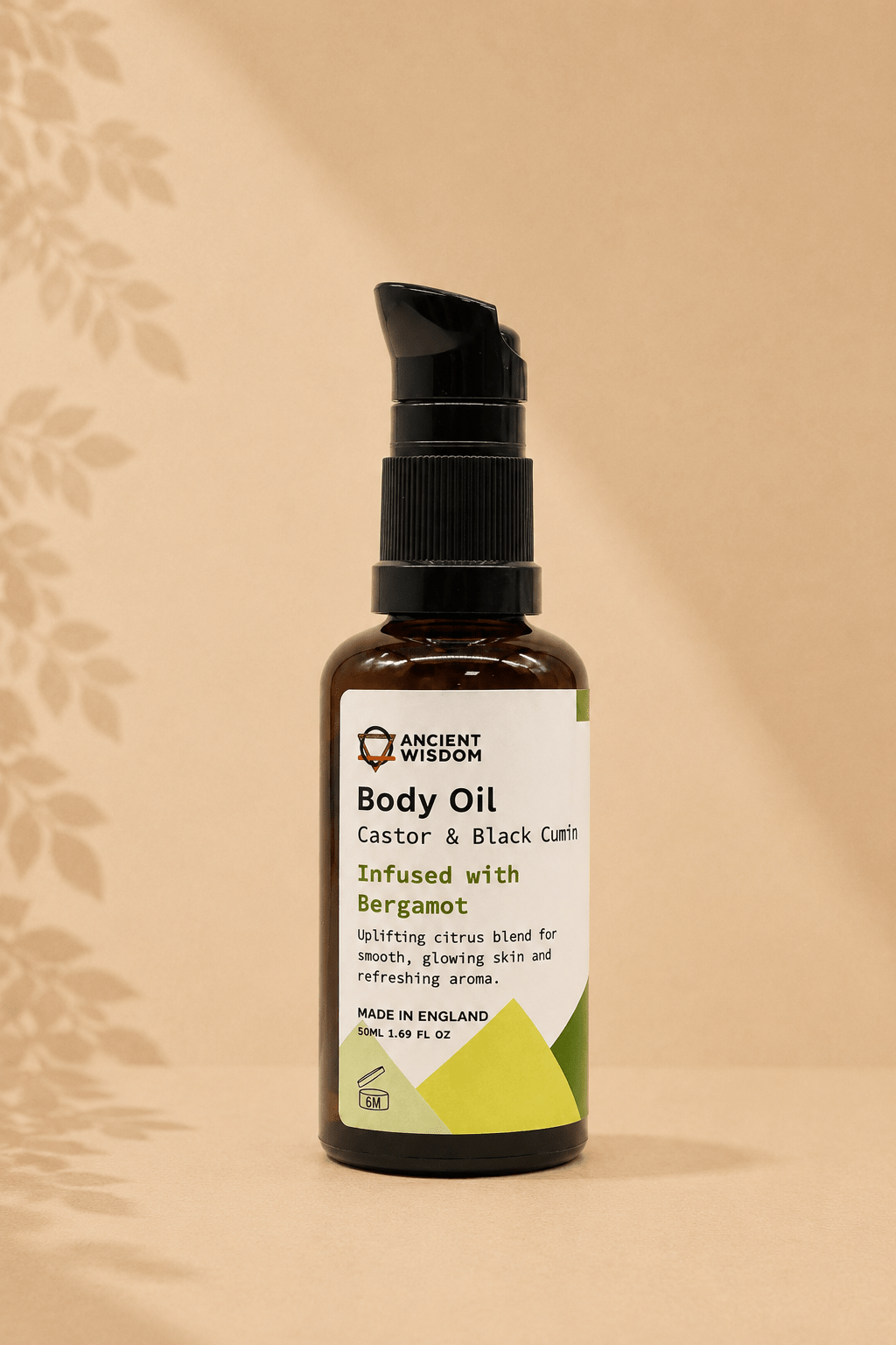 Biologische bodyolie met bergamot geur 50ml in een bruin transparant flesje met zwarte spuitknop