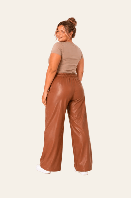 Lined women's trousers in eco-leather with high waist