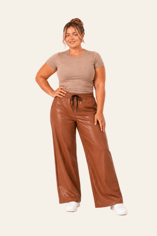 Lined women's trousers in eco-leather with high waist