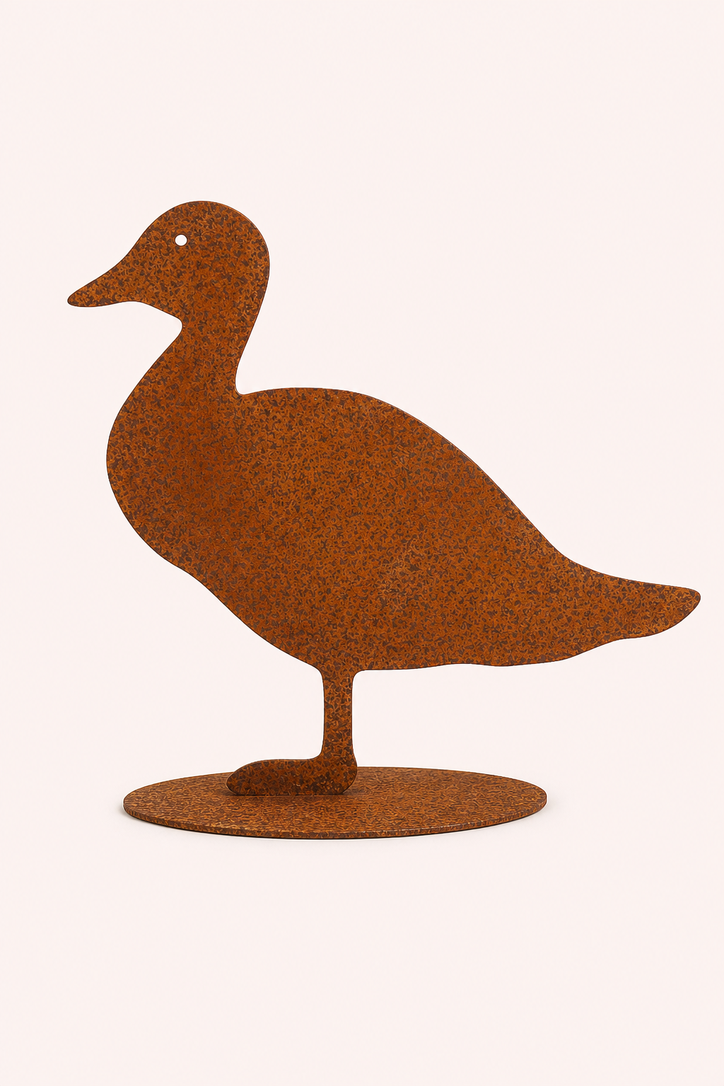 Roestige decoratieve eend op vloerplaat