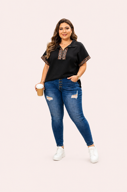 Zwarte top met luipaardprint en halve rits
