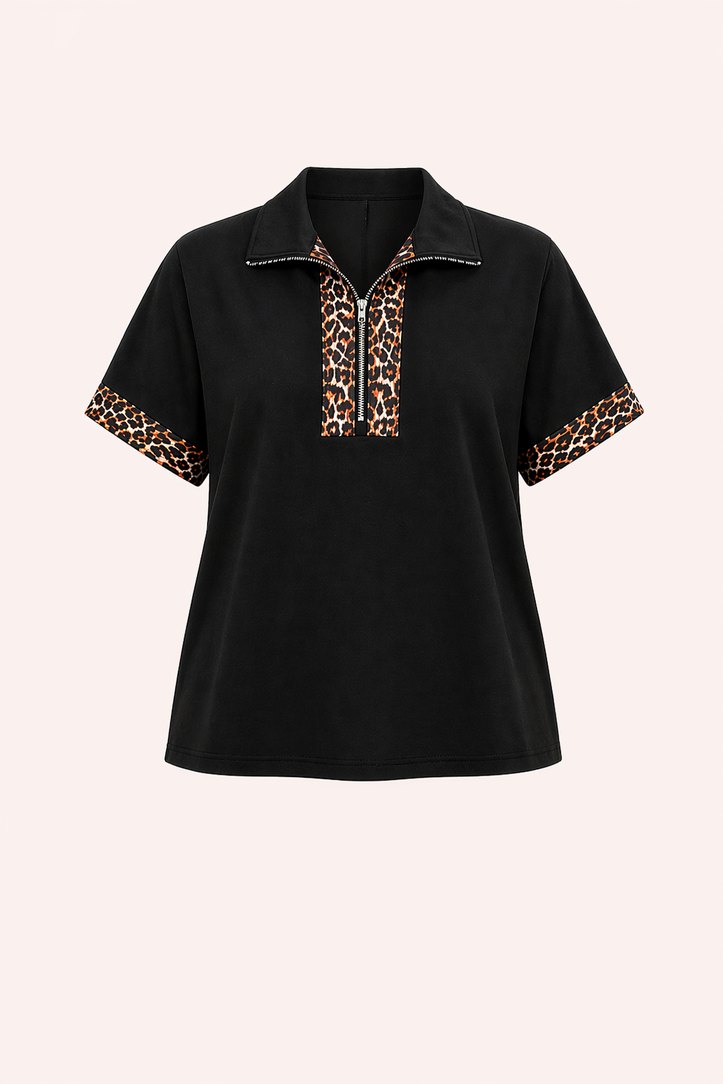 Zwarte top met luipaardprint en halve rits