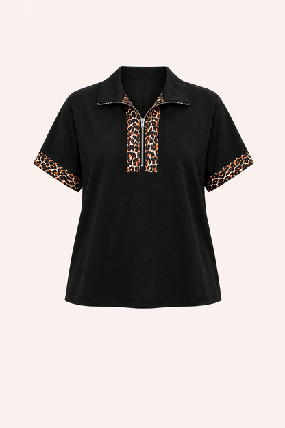 Zwarte top met luipaardprint en halve rits