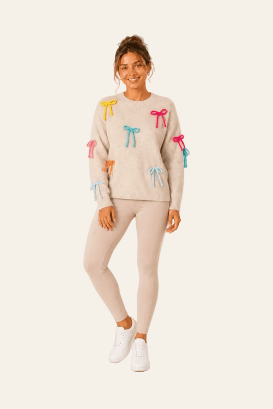 Pull femme à col rond, manches longues et petits nœuds décoratifs colorés