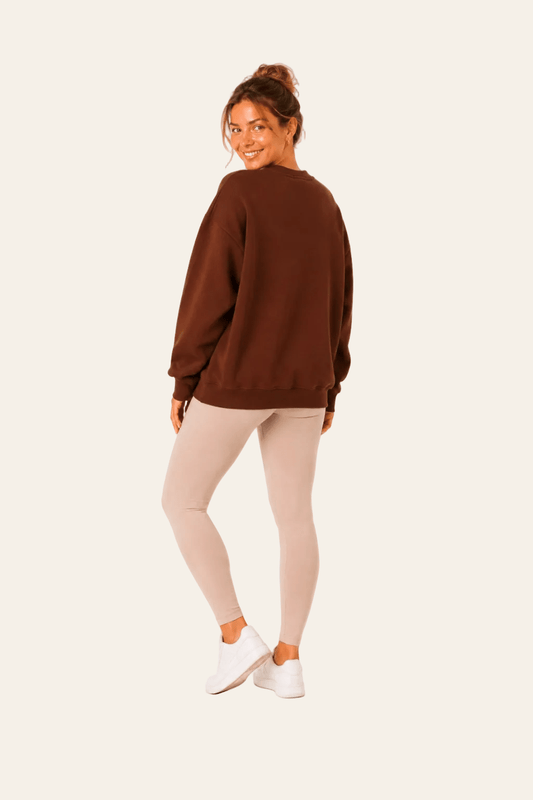 Damesblouse met ronde hals, lange mouwen en geborduurd opschrift