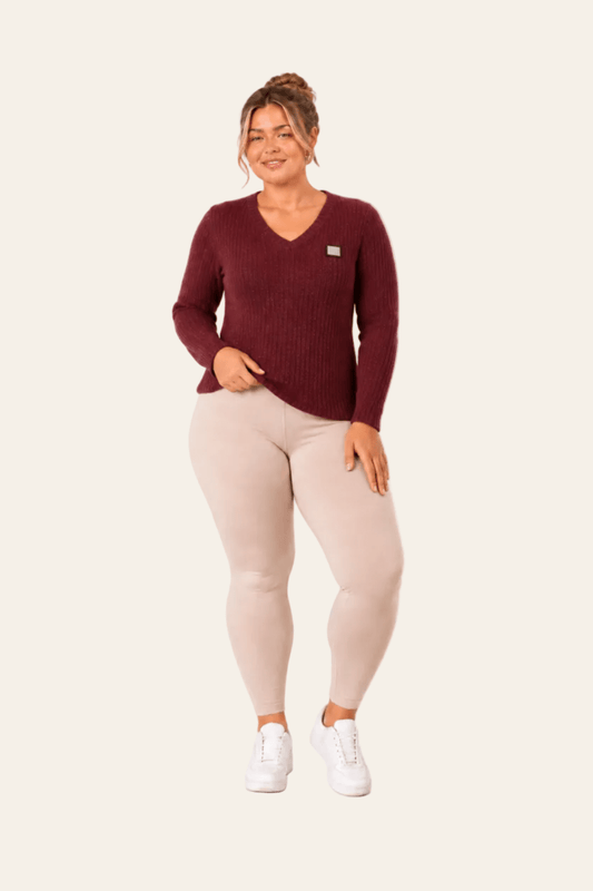 Ribbed V-neck sweater for women with a subtle emblem