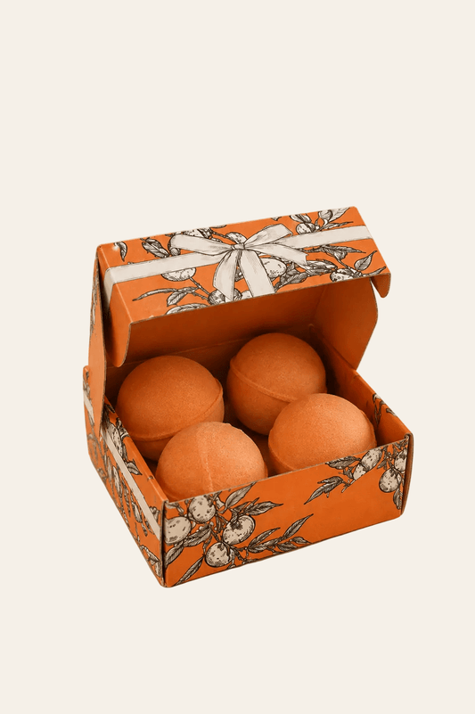 Geschenkdoos met vitamine C bruisballen set van vier oranje stuks in een oranje doos als productfoto