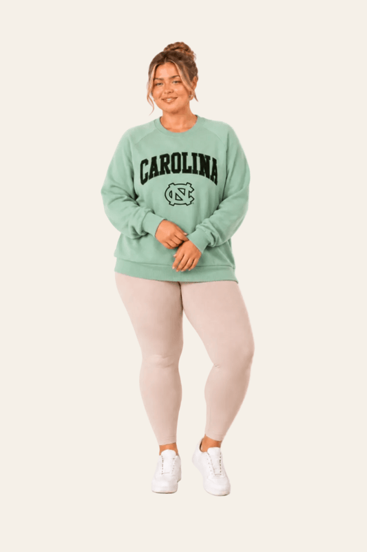 Lined women's round neck sweater with patch, embroidery and large lettering
