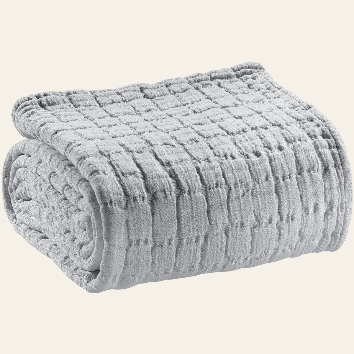 Gevouwen Swami bedsprei in parelgrijskleur met zacht stonewashed katoen en zichtbaar weefpatroon