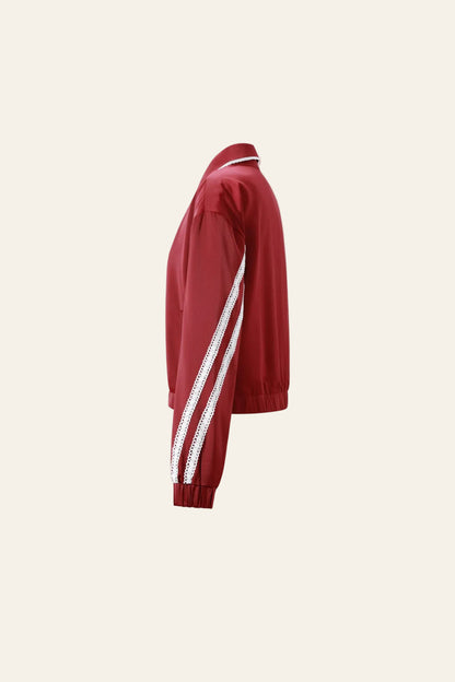 Gimme sportieve dames trainingspak met een trendy kraagje en kleurenclash
