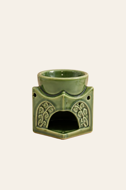 Achteraanzicht van groene Dark Jade Boeddha oliebrander met opening voor theelicht en bovenste geurschaal
