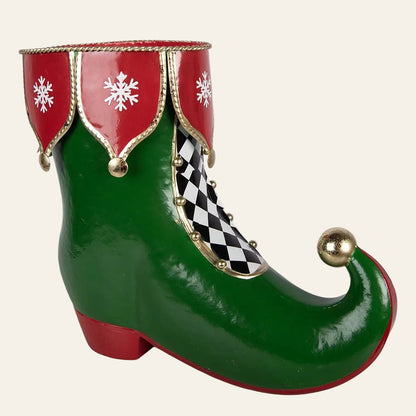 groene laars met rode afwerking met sneeuwvlokken en gouden accenten
