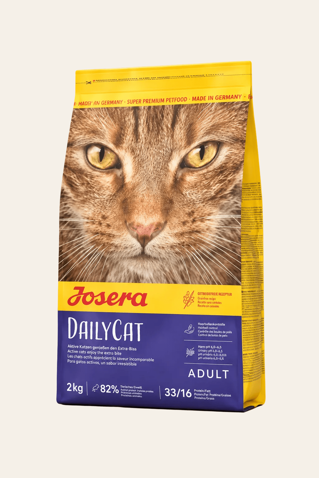 Josera Dailycat graanvrije kattenbrokken 2 kg in geel-paarse verpakking met kattengezicht, droogvoer met gevogelte voor volwassen katten.