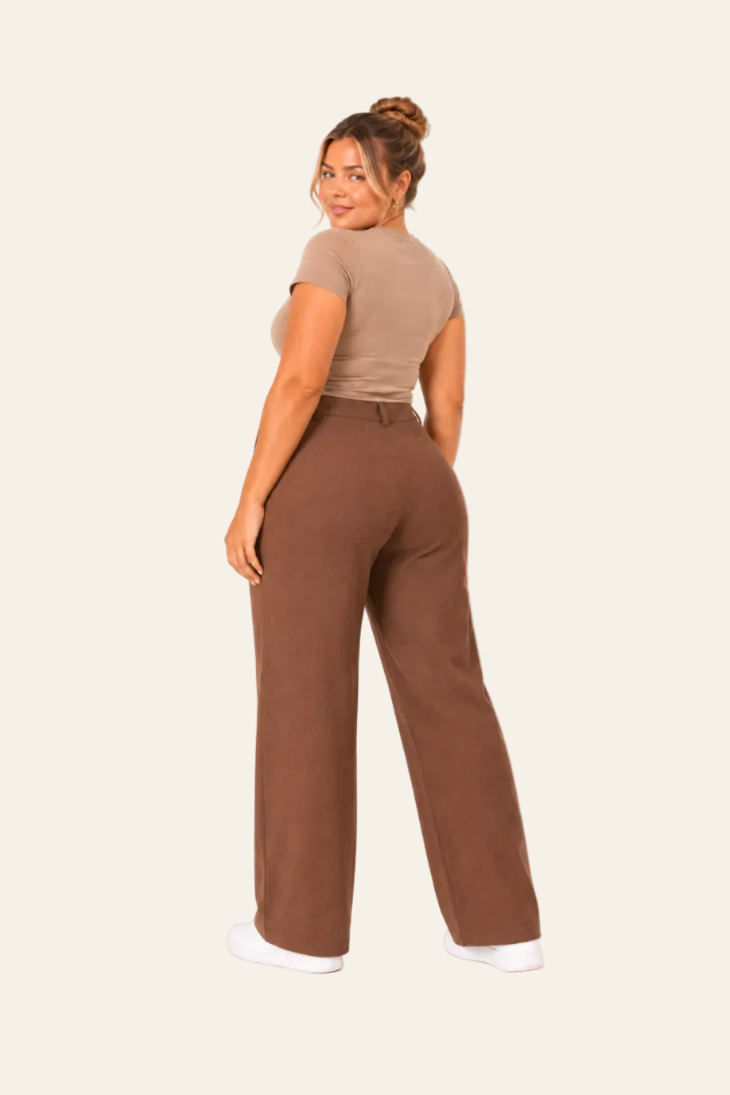 Elegant women's trousers with a high waist, wide legs, and side pockets