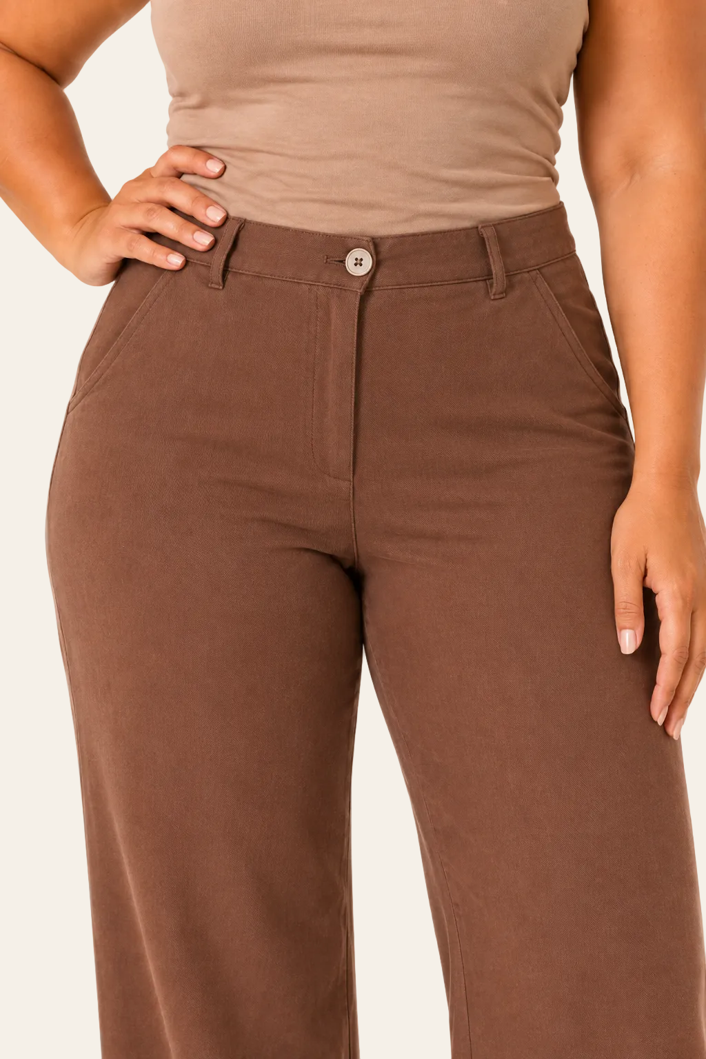 Elegant women's trousers with a high waist, wide legs, and side pockets