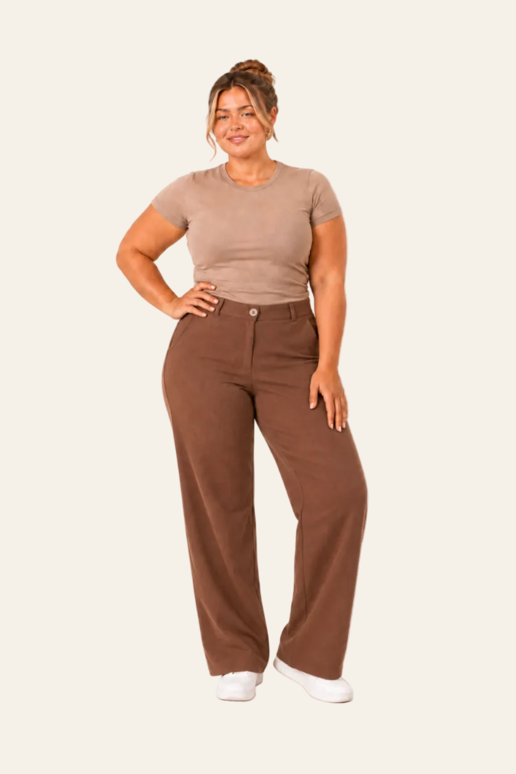 Elegant women's trousers with a high waist, wide legs, and side pockets
