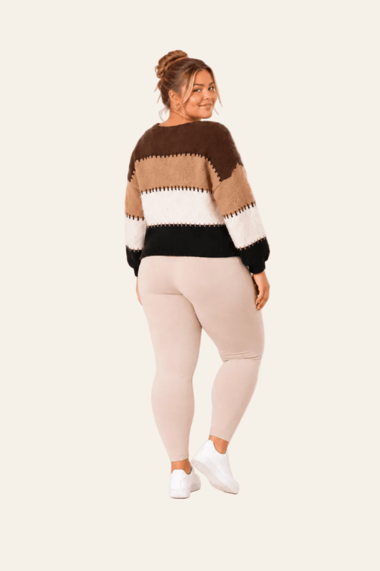 Loose-fitting women's jumper with a round neck and striped pattern