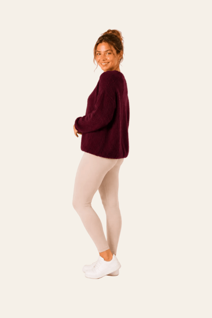 Oversized women's round neck jumper with batwing sleeves
