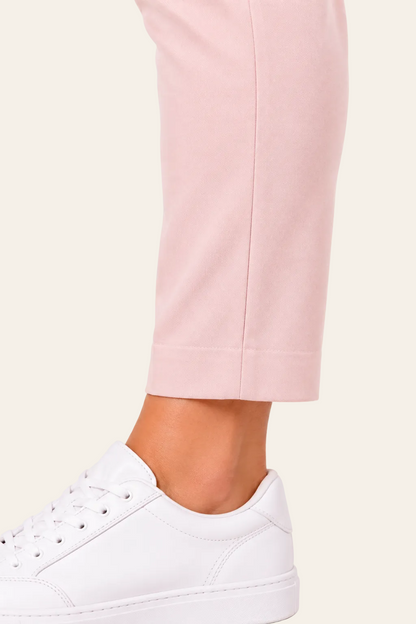 Roze enkellange damesbroek met hoge taille en steekzakken