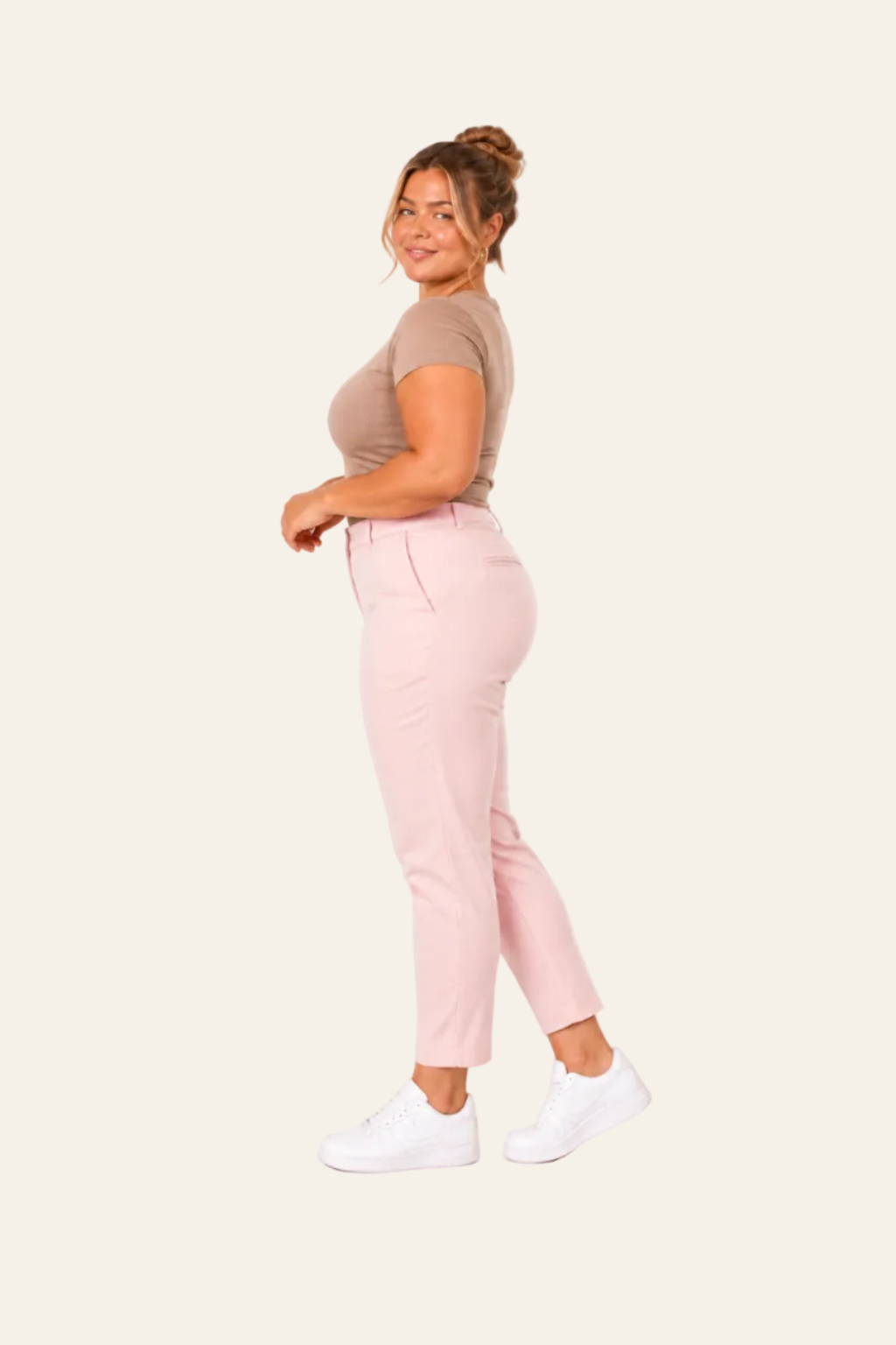 Roze enkellange damesbroek met hoge taille en steekzakken