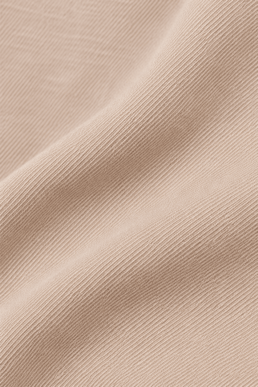 Detail van de stofstructuur van wide leg damesbroek met hoge taille.