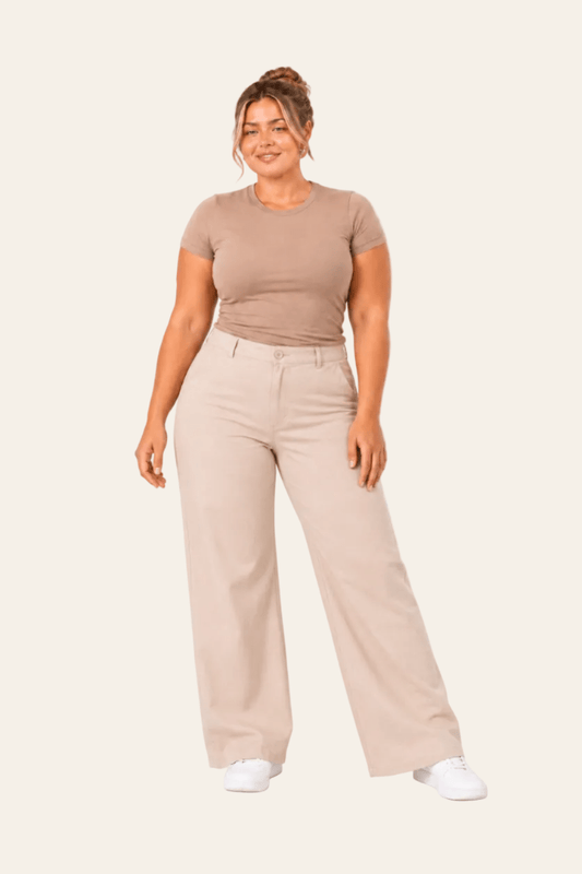 Stylish women's trousers with a high waist, wide legs, and side pockets