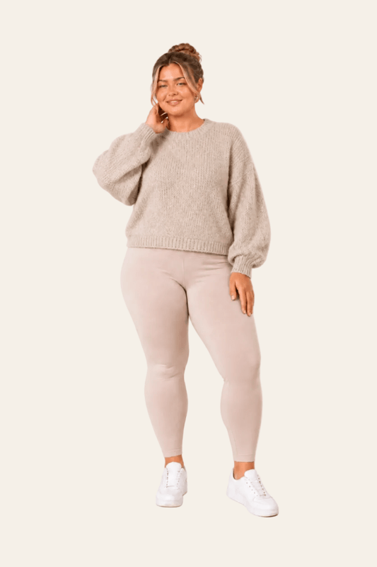 Stylish women's sweater with a round neck and subtle puff sleeves