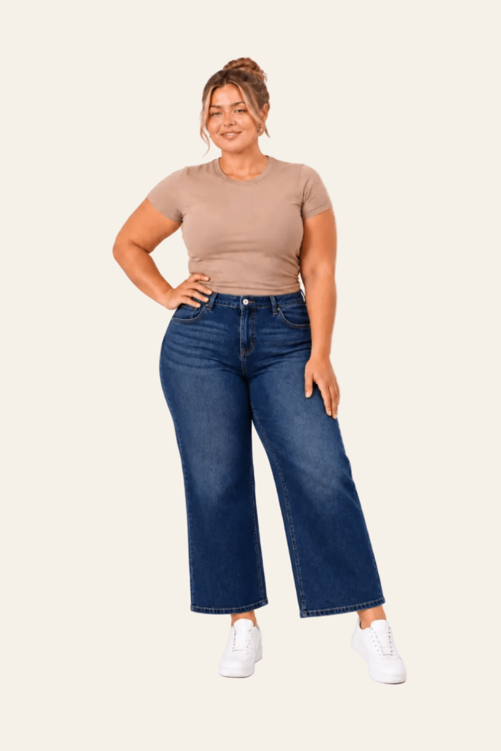 Vooraanzicht van stonewash blauwe jeans met hoge taille en wijde pijpen.