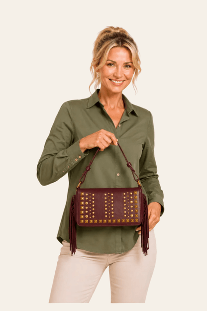Trendy bordeauxrode en zwarte schoudertas met goudkleurige studs
