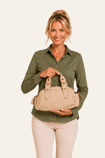 Trendy handtas met decoratieve siergespen