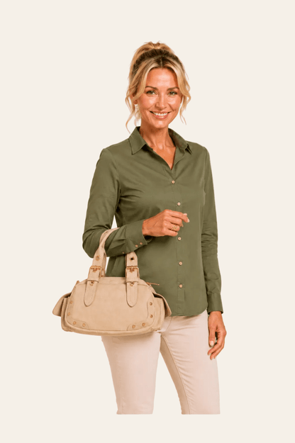 Trendy handtas met decoratieve siergespen