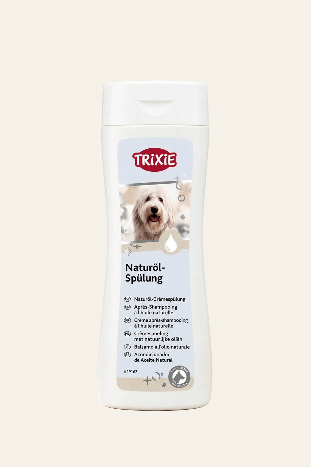 Trixie natuurlijke crèmespoeling voor honden met macadamia- en duindoornolie in witte flacon van 250 ml met hondenafbeelding.