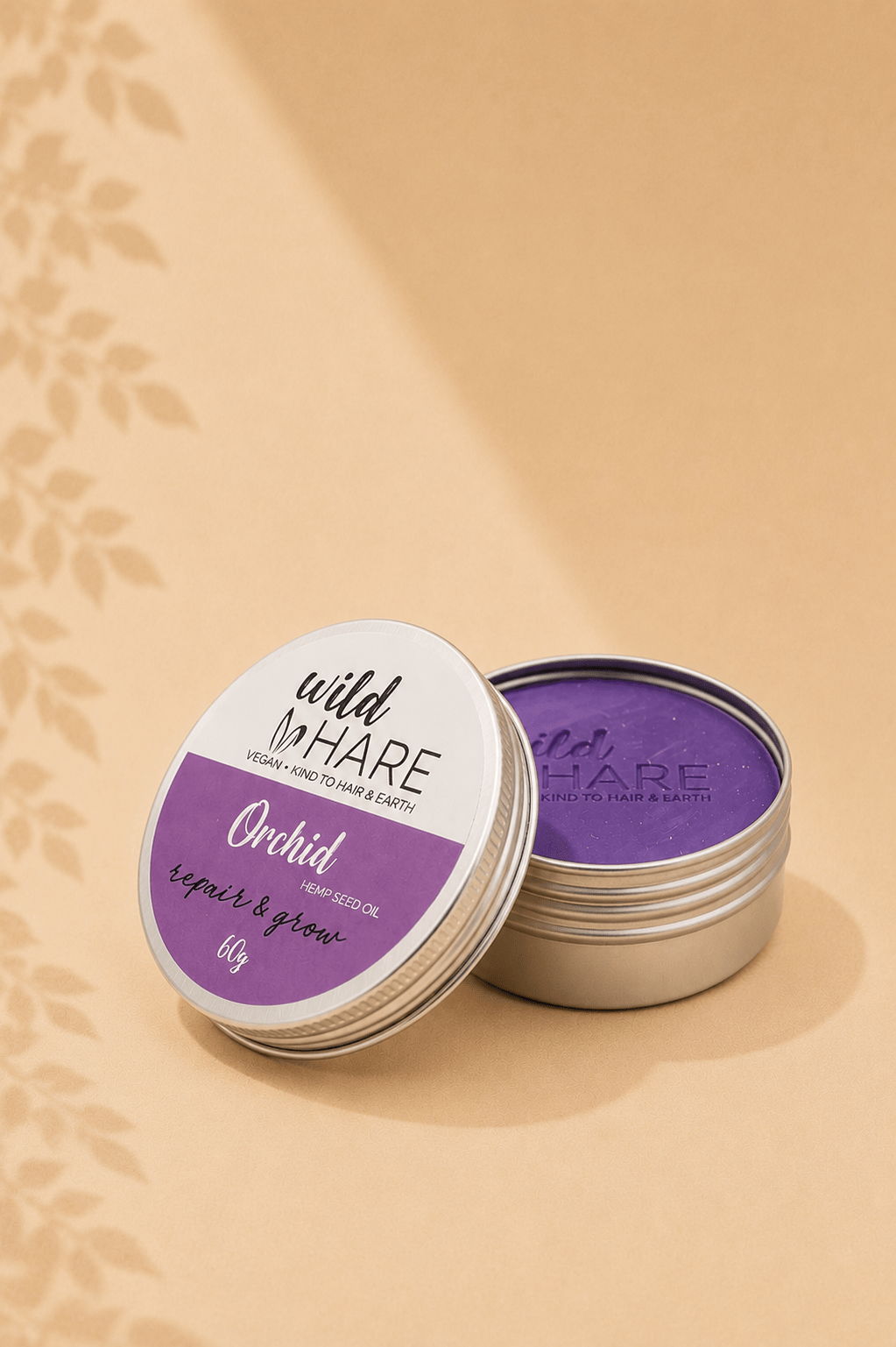  Vaste shampoo met orchideegeur in een zilver rond doosje met een draaideksel