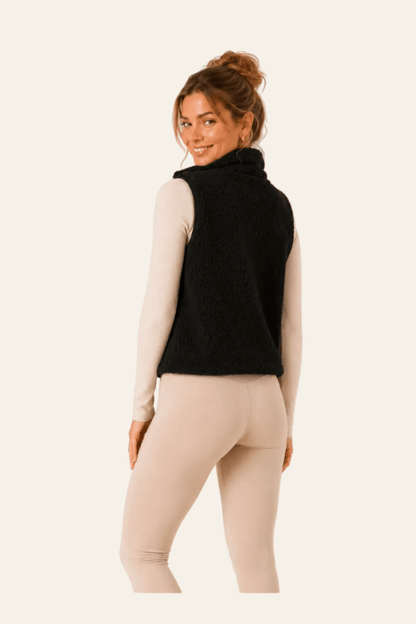 Zwarte damesbodywarmer in bontlook met ritssluiting
