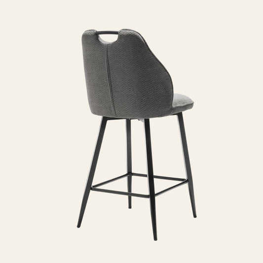 Adele barkruk in antracietkleur, achteraanzicht met ergonomisch gevormde zitting met rugleuning.